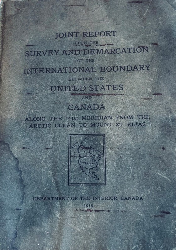 Book that documents the land surveying work that was completed to define the border between Alaska and the Yukon